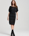 Chic comes easy with this belted Patterson J. Kincaid dress, semi-sheer and completely cool with black and blue stripes. Slouchy socks and booties add modern edge.