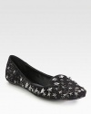 For an out of this world look, this sequin-covered smoking slipper topped with metal stars is the perfect choice. Sequin upper with metal star-shaped studsLeather lining and solePadded insoleImported