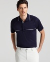 Stripes and raglan sleeves sharpen this classic polo from Zero Restriction Golf.