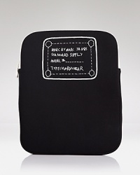 The writing is on this neoprene MARC BY MARC JACOBS case, which is designed to cleverly conceal (and protect) your iPad.