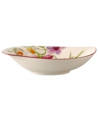 Prolong spring with this deep Mariefleur bowl. Splashy colors adorn premium white porcelain edged in red and crafted in a whimsical leaf shape. Mix and match with New Cottage dinnerware, also by Villeroy & Boch.