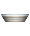 More than bold stripes and warm colors, the Origo serving bowl transitions from oven to table and into the dishwasher without a hitch. Combine with other Iittala dinnerware pieces to make any setting pop. Designed by Alfredo Haberli.