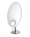 Focus up. Featuring an elegant oval shape and 10x magnifying inset, this vanity makeup mirror offers two views in one sophisticated design. Adjustable.