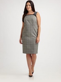 A sleek shift featuring a timeless plaid pattern and delicate lace details. This dress was designed to fit you flawlessly thanks to expert tailoring and a touch of stretch.Feminine necklineSleevelessPrincess seamsFrench dartsBack zipperBack ventFully linedAbout 26 from natural waist64% polyester/33% viscose/3% spandexDry cleanMade in Italy