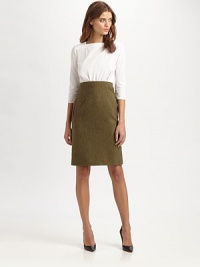 Cotton boatneck pairs with a high-waisted wool tweed skirt for a look that smoothly transitions from work hours to after hours. BoatneckThree-quarter sleevesAttached wool skirtSlash pocketsInvisible back zipperAbout 23 from natural waistBody: WoolContrast: CottonDry cleanImportedModel shown is 5'10 (177cm) wearing US size 4.