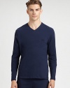 Knitted from soft cotton with a hint of stretch, a sharp v-neck pullover exudes sporty sophistication in a streamlined, classic-fit silhouette.V-neck95% cotton/5% elastaneMachine washImported