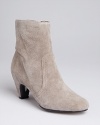 Go mad for these basic but stylish booties; designer Sam Edelman gives them a point of difference with shapely curved heels in a kittenish, walkable height.