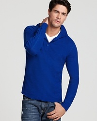 A lightweight henley-style hoodie in a soft slub weave.