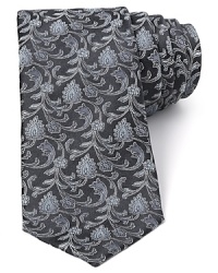 A stately tie in lavish silk offers distinction and refinement to your attire, whether you're hosting a dinner party or leading a boardroom discussion at the firm.