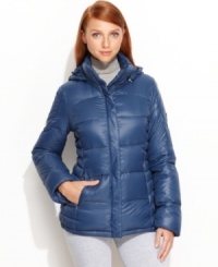 Perfect for packing, Calvin Klein's puffer jacket features a lightweight feel with heavyweight warmth thanks to a down-blend fill!