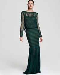 Tadashi Shoji lends a modern touch to timeless lace with an allover striped pattern. A rich, earthy green hue feels of-the-moment.