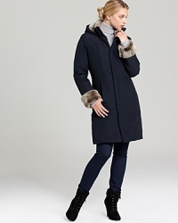 An A-line silhouette lends a feminine feel to a winter-ready coat from WOOLRICH JOHN RICH & BROS.