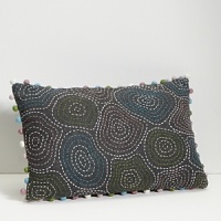 Beaded beauty bestows this decorative pillow. Multicolored with an abstract oval design allover, this pillow was made to be seen. Finished with colorful pom-pom balls.