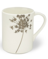 A modern blossom brings an air of tranquility to this chic mug from Mikasa. In gleaming white bone china for a clean, minimalist feel.