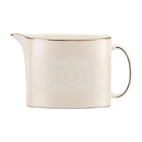 Embellished with a delicate chantilly lace design that evokes romance, whimsy and vintage wedding veils, kate spade new york's Chapel Hill creamer is the perfect touch for sophisticated dinner parties and holiday gatherings.