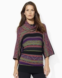 Crafted in a luxuriously soft blend of fabrics, a jacquard sweater features elegant kimono sleeves for ease of movement.