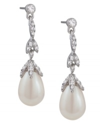 Fit for a princess. Carolee's elegant linear teardrop earrings convey a regal bearing. Adorned with glass pearls and sparkling glass accents, they're crafted in silver tone mixed metal. Approximate drop: 1-1/2 inches.