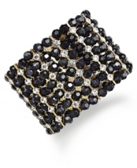 Slip on seductive style with this mysterious stretch bracelet with INC International Concepts. Black plastic stones and glass crystals are flaunted on a layered silhouette. Crafted in 12k gold-plated mixed metal. Approximate diameter: 2-1/4 inches.