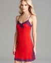 Vibrant lace climbs up the sides and adorns the neckline of this elegant chemise from Natori.