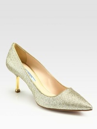 Glitter pumps with a point toe and goldtone metal-tip heel. Self-covered metal-tip heel, 2½ (65mm)Glitter-coated suede upperPoint toeLeather lining and solePadded insoleMade in Italy