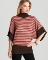 Stylish dolman sleeves add a chic new look to this Trina Turk sweater--a classic turtleneck, striped to the nines, for an outstanding fall look.