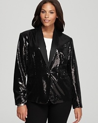 Dripping with decadent sequins, this Calvin Klein Plus jacket steals the spotlight with unapologetic glamour appeal.