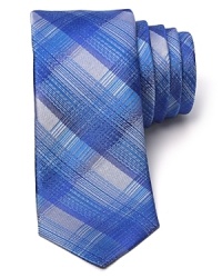 HUGO furnishes this skinny silk tie with an artful brushstroke check for an innovative take on classic plaid.