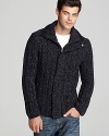 Marled virgin wool gives depth to this cozy cardigan and the snap placket conceals the zip front for versatile styling.