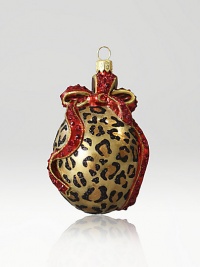 From the Safari collection. This season's new glass ornament collection are mouth blown and decorated in Poland with a wonderful team of old world craftsmen. This one is detailed with crystals, hand applied jewel tone colors and scrolls as if they were a fine piece of jewelry.GlassCrystalMouth blownHand-painted and hand-set3.75H X 2.25W X 1.75DImported