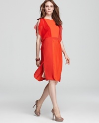 In a vibrant hue, pretty pleats and a majestic split-sleeve silhouette, BCBGMAXAZRIA's Caterina midi dress brings in the season with glowing style.