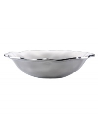 Pretty and polished, this Organics bowl from Lenox's collection of serveware and serving dishes combines a natural shape in bright aluminum with a playful ruffled edge.