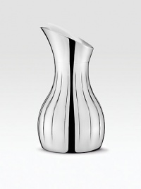 From the Legacy Collection. A modern classic, sleek and elegant, with curvaceous lines for graceful pouring and an insulated construction that maintains temperature of the contents.Stainless steel White stopper 8H X 4¼W Dishwasher safe Imported