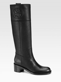 Tall pebbled leather silhouette with a stacked heel and GG logo. Stacked heel, 2 (50mm)Shaft, 16Leg circumference, 14Leather upperPull-on styleLeather lining and solePadded insoleMade in Italy