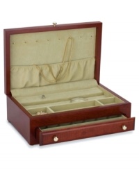 Fill this cherry wood jewelry chest with your favorite pieces to prevent accidental damage and loss. Polished brass pulls accent the cover and drawer while imitation suede in aloe adds a touch of luxury to the interior.