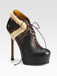 Shearling trim in a contrasting tone adds textural-appeal to this tall, lace-up platform of paneled leather. Stacked heel, 5½ (140mm)Hidden platform, 1½ (40mm)Compares to a 4 heel (100mm)Leather and deerskin upper with shearling trimLeather lining and solePadded insoleMade in Italy