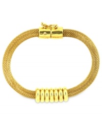 Mesh together the perfect outfit. Anne Klein's flex bracelet features a mesh pattern punctuated with a solid, shiny accent. Crafted in gold tone mixed metal. Approximate diameter: 8 inches.