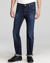 With a regular fit that's straight through the thigh down to the bottom and a dark blue wash for classic appeal.