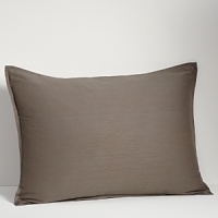 Smooth and luxurious to the touch the coverlet and bed ensemble are woven in 100% cotton sateen.