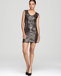 Light up the room in this sparkly, sequin-adorned party dress by GUESS.