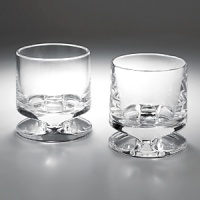 Made of solid, sparkling full-lead Nambé Crystal, Groove barware is mouth-blown and hand-cut in the traditional manner by the finest European glassblowers according to a 300-year-old process. Their heavy, solid bottoms ensure stability.