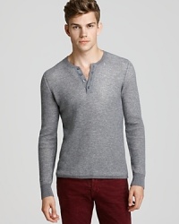 An effortless contribution to your relaxed sweater wardrobe boasts classic, masculine appeal in a neutral hue.