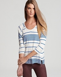 Slim contrast stripes enrich this laid-back Joie top rendered in breathe-easy linen.