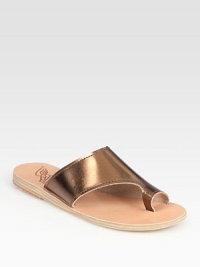 Crafted from the finest metallic leather, this vacation-to-city basic can be paired with a Grecian-inspired maxi dress or rolled jeans. Metallic leather upperLeather lining and soleMade in GreeceOUR FIT MODEL RECOMMENDS ordering true whole size; ½ sizes should order the next whole size up. 