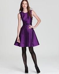 Subtle sheen lends chic luster to a fit-and-flare kate spade new york dress, accentuated by a patent belt for impeccable elegance.