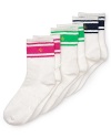 Soft and cozy socks with vibrant stripe and logo detail at ankle.