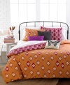 An exotic escape! Give you space a dose of extra flair with this Around the World duvet cover set featuring, an artistic design in vibrant orange hues. Pair with our assortment of decorative pillows.