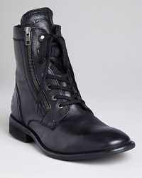 Diesel's Miliboots show off a side zip detail for an edgy finish. A laceup vamp completes the look.