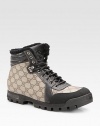 GG plus fabric with leather and fur trim. Rubber sole Water repellent Made in Italy 