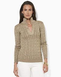 An essential sweater, crafted from soft cable-knit cotton and interwoven Lurex®, features a split mockneck collar for a flattering finish.