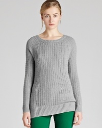 Knitwear has personality this season, with a play on shape, texture and color. This soft REISS sweater is sure to comfort on dreary days, while the waffle stitch and crossover back demonstrates a contemporary edge.